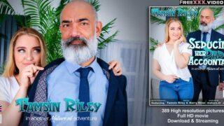 MatureNL – Young and horny Tamsin Riley is fucking and sucking her way older dad’s accountant on the couch